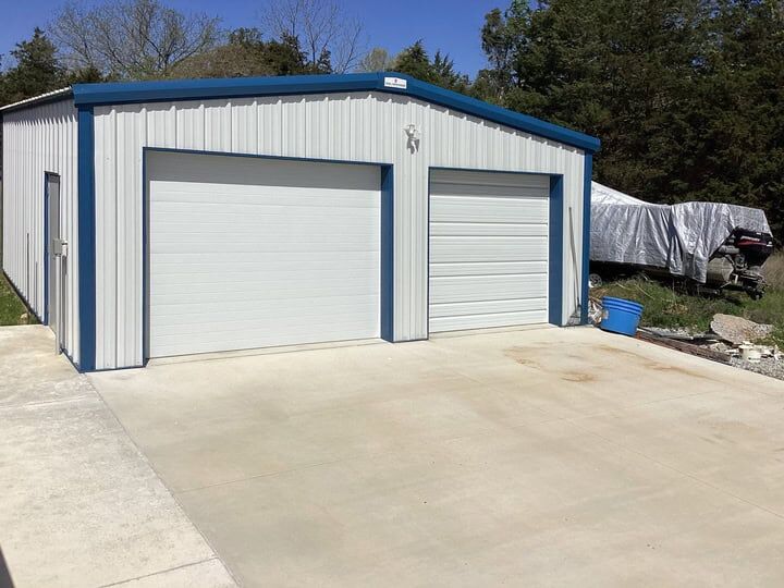 Two Car Steel Garage by Steel Commander Corp | 40+ Years Expertise | American-Made Steel Buildings